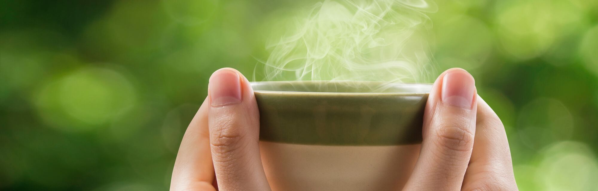 steaming cup of green tea